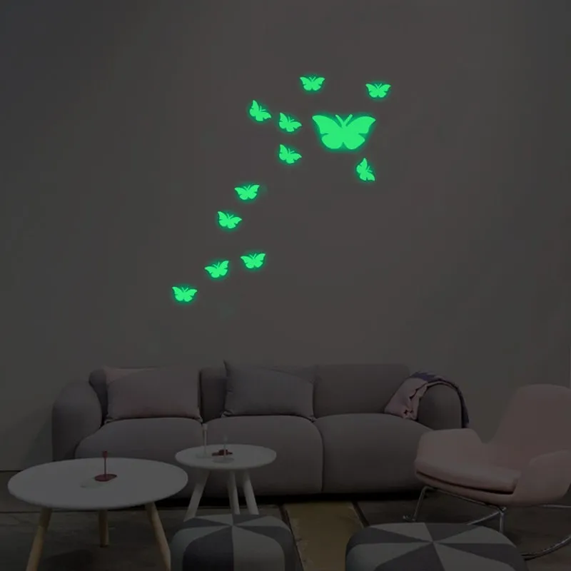 Selvlysende sommerfugle wallsticker. 1 stor, 12 små - 13 stk i alt.